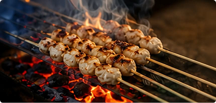Sate dibakar di atas bara